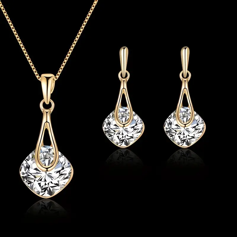 elegant women’s jewelry set – golden square pendant necklace & teardrop crystal earrings | sparkling artificial crystal set | wedding & party jewelry | geometric design | zinc alloy elegant women’s jewelry set – golden square pendant necklace & teardrop crystal earrings | sparkling artificial crystal set | wedding & party jewelry | geometric design | zinc alloy